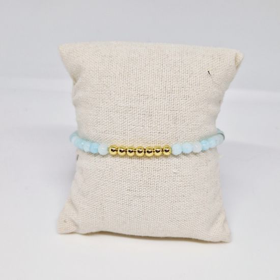 Afbeeldingen van Armband  goud met oceaanblauw facet natuursteen kralen  